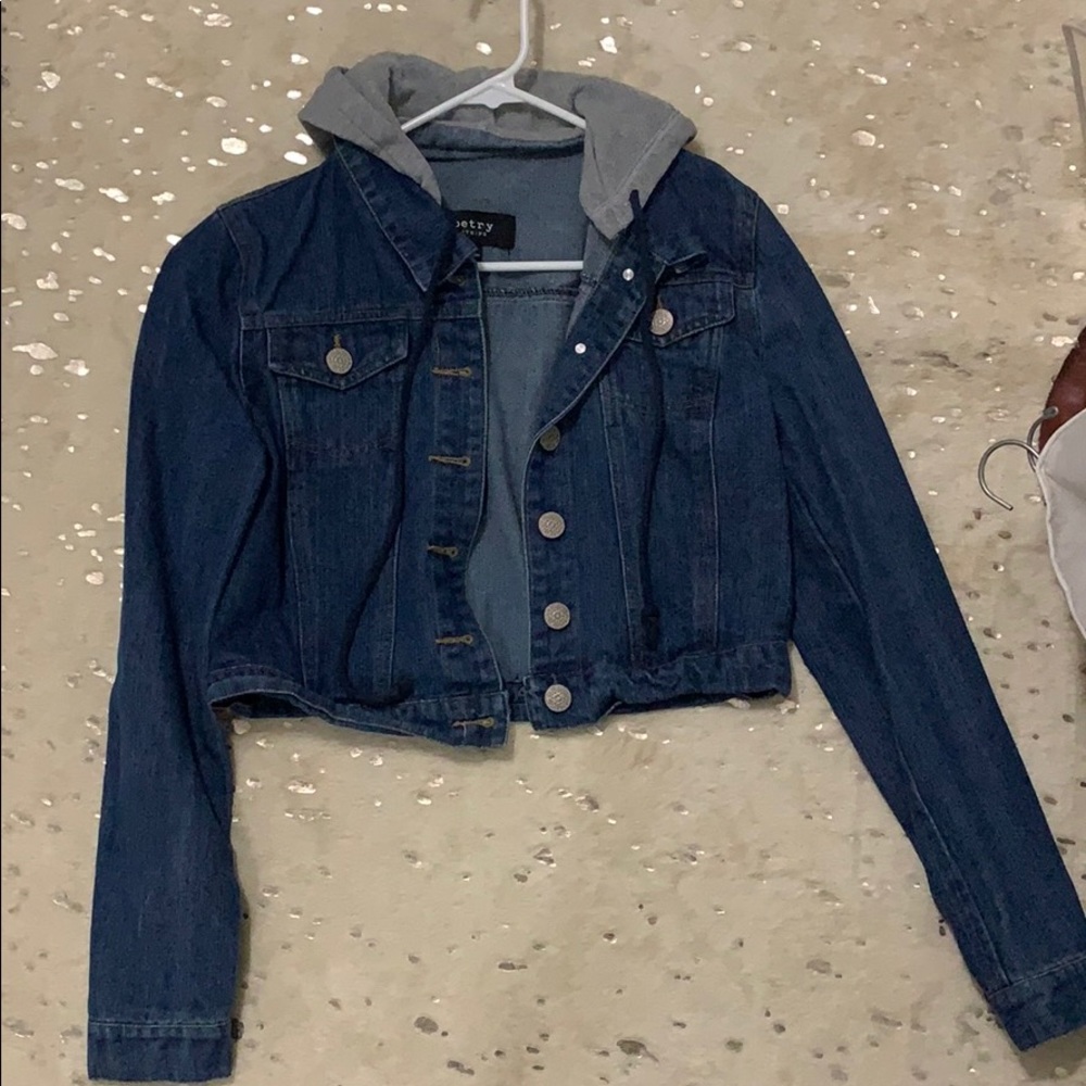 Blue jean jacket with gray hood